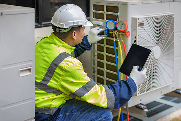 Professional Hvac Installation technician working in Falkville, AL